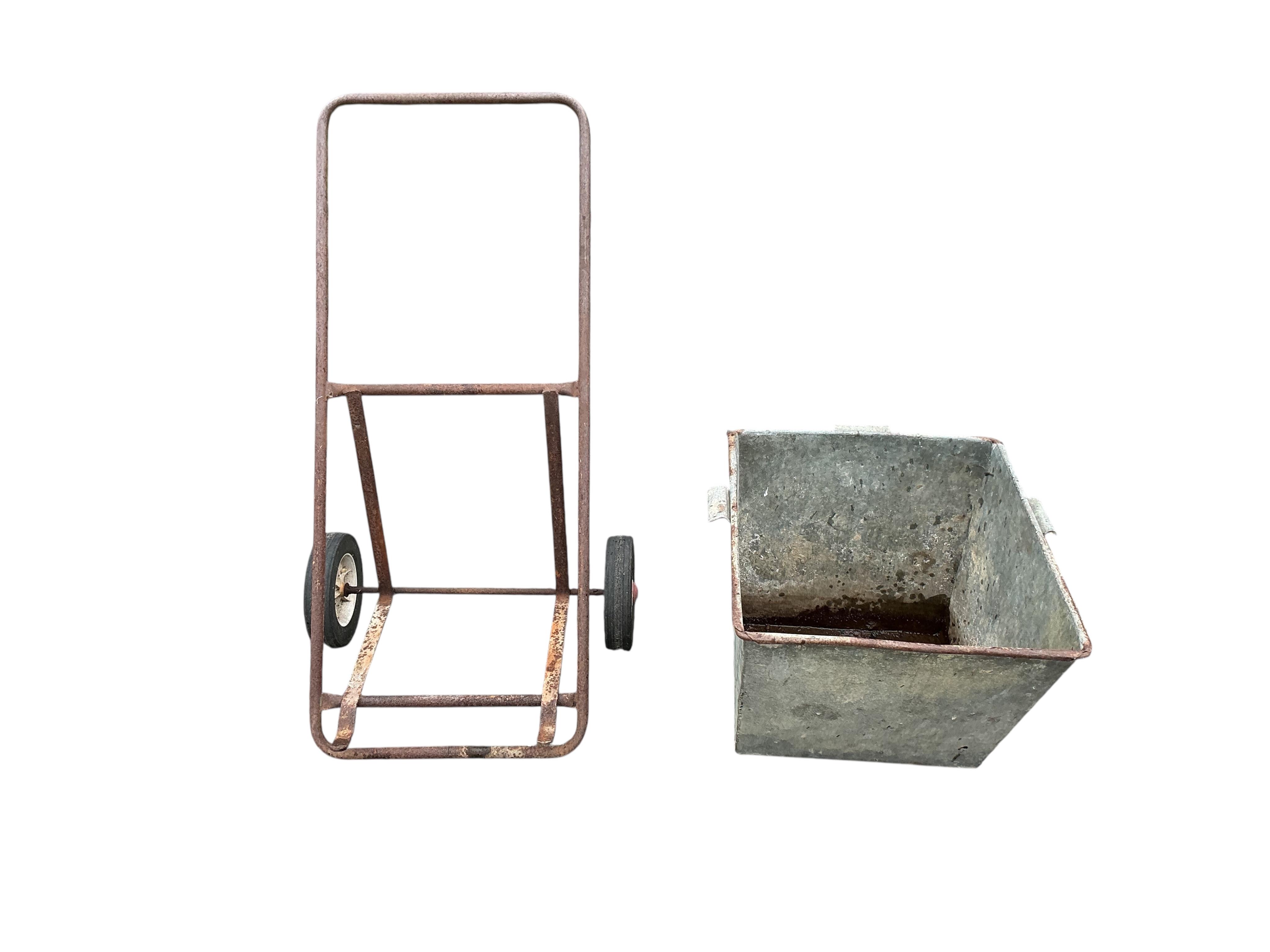 A vintage galvanised garden wheelbarrow, height 91cm